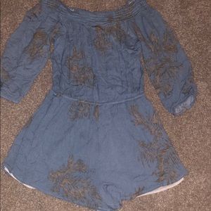 Blue romper with tan leaves super cute